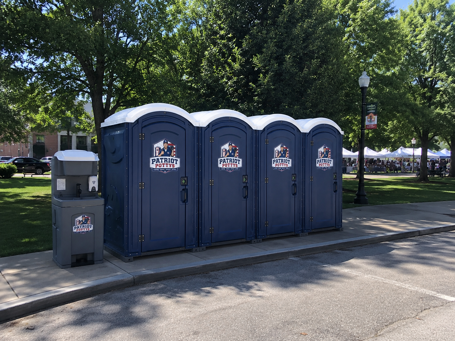 Patriot Pottys restrooms and handwash station serving a public event
